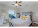 Bedroom with a double bed, dresser, and full-length mirror at 1873 Donahue Dr, Ocoee, FL 34761