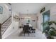 Elegant dining room featuring a rustic wooden table and chandelier at 1873 Donahue Dr, Ocoee, FL 34761