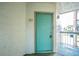 Teal apartment entrance with keyless entry at 2230 Cascades Blvd # 207, Kissimmee, FL 34741