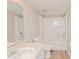 Clean bathroom with a shower/tub combo and white vanity at 2230 Cascades Blvd # 207, Kissimmee, FL 34741