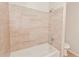 Clean bathroom with a tub and shower at 2230 Cascades Blvd # 207, Kissimmee, FL 34741