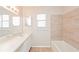 Bathroom with double vanity and tub at 2230 Cascades Blvd # 207, Kissimmee, FL 34741