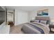 Serene bedroom with wood-look floors and ample closet space at 2230 Cascades Blvd # 207, Kissimmee, FL 34741