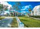 Community with grassy areas and trees at 2230 Cascades Blvd # 207, Kissimmee, FL 34741