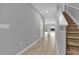 Bright and airy entryway with tile floors and staircase at 232 Rustic Loop, Sanford, FL 32771