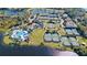 Aerial view of community pool, tennis courts, and clubhouse at 252 Wimbledon Cir # 1702, Lake Mary, FL 32746