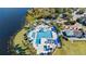 Aerial view of community pool, tennis courts, and clubhouse at 252 Wimbledon Cir # 1702, Lake Mary, FL 32746