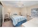 Bedroom with a full-size bed and window seat at 252 Wimbledon Cir # 1702, Lake Mary, FL 32746