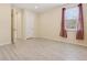 Spacious bedroom with light-colored flooring and window at 284 Tuska Reserve Cv, Casselberry, FL 32707