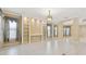 Bright dining room with built-in shelving and large windows at 284 Tuska Reserve Cv, Casselberry, FL 32707