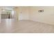 Spacious living room with light wood flooring and an open floor plan at 284 Tuska Reserve Cv, Casselberry, FL 32707