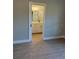 Primary bathroom with double vanity and sliding barn door entry at 3 Fisher Loop Crse, Ocklawaha, FL 32179