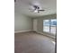 Living room with vinyl flooring and a ceiling fan at 3 Fisher Loop Crse, Ocklawaha, FL 32179