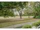 View of a lush green backyard and walking path at 3117 Eagle Blvd # C, Orlando, FL 32804