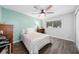 Cozy bedroom with wood-look floors and a ceiling fan at 3117 Eagle Blvd # C, Orlando, FL 32804