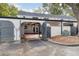 Private covered parking with gated entry and string lights at 3117 Eagle Blvd # C, Orlando, FL 32804