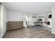 Light and airy living room with wood-look floors and built-in workspace at 3117 Eagle Blvd # C, Orlando, FL 32804