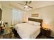 Relaxing main bedroom with a king-size bed and calming decor at 3151 Paradox Cir # 103, Kissimmee, FL 34746