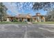 Community clubhouse with attractive landscaping at 32604 View Haven Ln, Sorrento, FL 32776