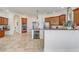 Open kitchen with granite counters, island, and double ovens at 32604 View Haven Ln, Sorrento, FL 32776