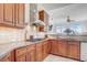 Gourmet kitchen features granite countertops, custom cabinets, and a stainless steel range hood at 32604 View Haven Ln, Sorrento, FL 32776