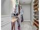 Walk-in closet featuring custom built-in shelving for shoes, clothes and other storage at 32604 View Haven Ln, Sorrento, FL 32776
