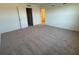 Spacious bedroom with plush carpeting and ensuite bathroom at 3265 Vesara Dr, Davenport, FL 33837