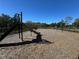 Community playground with slide and swings at 3265 Vesara Dr, Davenport, FL 33837