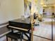 Relaxing clubhouse lounge with a grand piano and comfortable seating at 370 Silver Maple Rd, Groveland, FL 34736