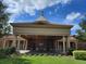 Elegant community clubhouse with a grand entrance and columns at 370 Silver Maple Rd, Groveland, FL 34736