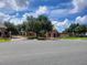 Inviting community entrance with landscaping and a grand entrance at 370 Silver Maple Rd, Groveland, FL 34736