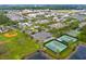 Aerial view of community, showing homes, park, and tennis courts at 3721 Cleary Way, Orlando, FL 32828