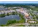 Aerial view of a town center with lake and shops at 3721 Cleary Way, Orlando, FL 32828