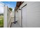 Outdoor shower with privacy wall and modern fixture at 4 Sea Hawk Dr, Ormond Beach, FL 32176