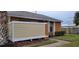 Tan colored exterior wall and walkway next to an orange building at 42 Silver Oak Cir, Kissimmee, FL 34743