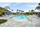 Community pool with plenty of lounge chairs at 4398 Davos Dr, Clermont, FL 34711