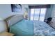 Main bedroom with ocean view and king-size bed at 4575 S Atlantic Ave # 6703, Port Orange, FL 32127