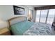 Main bedroom with ocean view and king-size bed at 4575 S Atlantic Ave # 6703, Port Orange, FL 32127