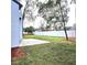 Spacious backyard with patio, privacy fence, and lawn at 4940 Spring Run Ave, Orlando, FL 32819