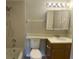 Clean bathroom with tub, toilet, and vanity at 5275 Images Cir # 306, Kissimmee, FL 34746