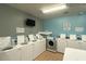 Convenient on-site laundry facility with modern machines at 5275 Images Cir # 306, Kissimmee, FL 34746