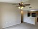 Open concept living room with high ceilings and fan at 5275 Images Cir # 306, Kissimmee, FL 34746