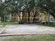 Community volleyball court with surrounding trees at 5275 Images Cir # 306, Kissimmee, FL 34746