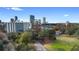 Aerial view of lakefront property with city skyline in background at 530 E Central Blvd # 603, Orlando, FL 32801