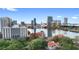 Gorgeous aerial view of the city skyline featuring a large lake, lush park, and charming red roof buildings at 530 E Central Blvd # 603, Orlando, FL 32801