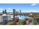 Stunning aerial view showcases a vibrant cityscape with a picturesque lake and colorful foliage at 530 E Central Blvd # 603, Orlando, FL 32801