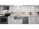 Modern kitchen with stainless steel sink and marble countertops at 530 E Central Blvd # 603, Orlando, FL 32801