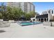 Inviting pool area featuring lounge chairs and an adjacent cabana for relaxing by the pool at 530 E Central Blvd # 603, Orlando, FL 32801