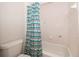 Bathroom with a shower/tub combo and patterned shower curtain at 532 Orange Dr # 23, Altamonte Springs, FL 32701