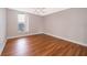 Bright bedroom with wood-look floors and ceiling fan at 532 Orange Dr # 23, Altamonte Springs, FL 32701